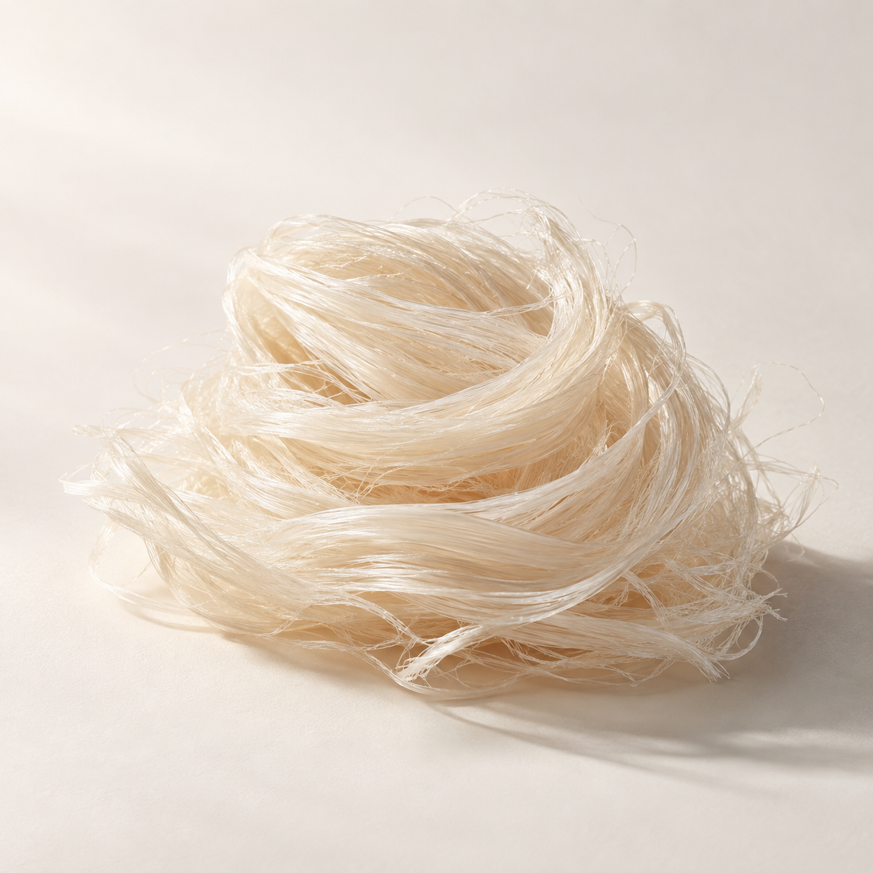 Fine ivory fibers representing collagen extract