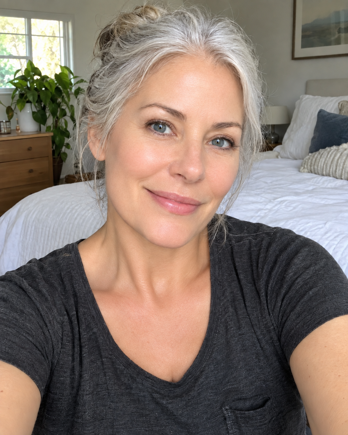 Illustrative selfie of a woman in her bedroom